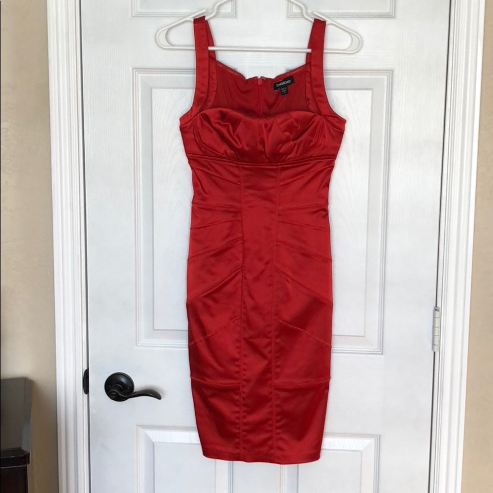 Burnt orange Bebe bodycon dress